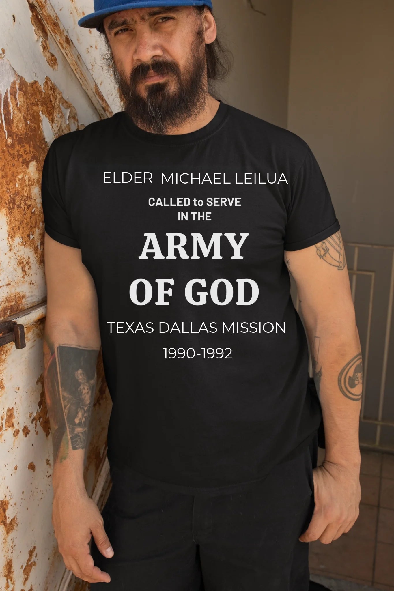 t-shirt-mockup-featuring-a-bearded-man-leaning-against-a-rusty-wall-32841